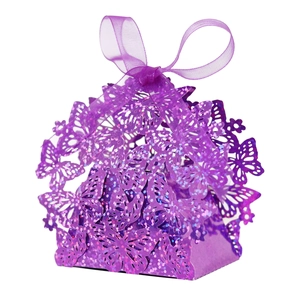Sparkly purple laser-cut butterfly wedding favor box with glitter finish and ribbon