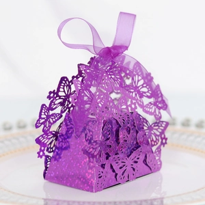 Detailed laser-cut butterfly gift box in purple glitter paper with elegant organza ribbon