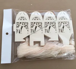 Bulk set of 50 laser-cut wedding favor boxes with ribbon and bride groom silhouette