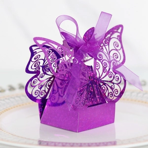 Detailed view of purple laser-cut butterfly gift box with glitter finish and silk ribbon