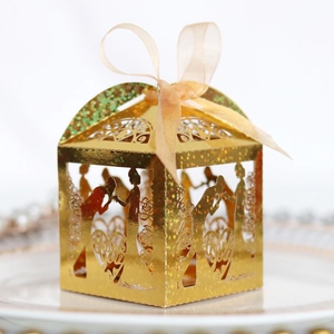 Golden laser cut rose wedding favor box with heart silhouette and thank you ribbon