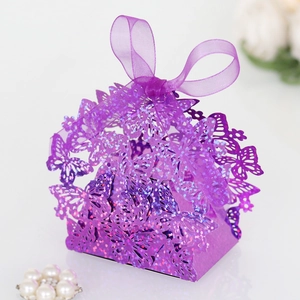 Detailed laser-cut purple glitter butterfly candy box with lavender ribbon bow on white base