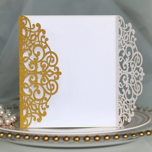Detailed laser-cut hollow greeting card with gold glitter film on white cardstock