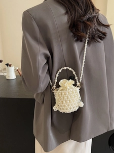 Fashionable hand-woven pearl bucket bag with drawstring pouch and pearl shoulder strap