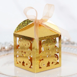 Hollow gold bear candy box with glitter finish and pink ribbon for baby shower gifts