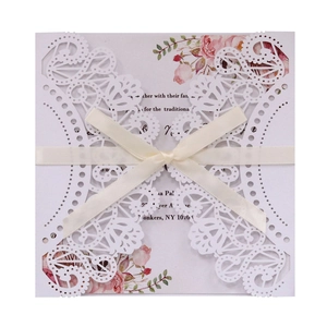 Lace hollow laser-cut wedding invitation with cream ribbon and floral inner card