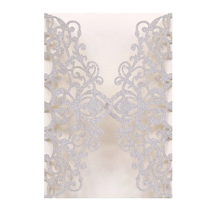 Elegant laser-cut silver glitter wedding invitation card with intricate floral scroll patterns