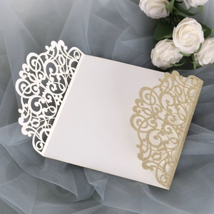 Intricate laser-cut champagne gold glitter wedding invitation with European patterns