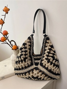 Large hand-woven shoulder tote bag with black and beige geometric hollow knit patterns