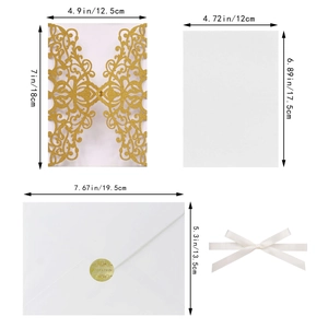 Detail set of laser-cut glitter wedding invitations with dimensions and satin ribbon
