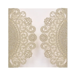Detail of champagne gold laser-cut lace wedding invitation cover with glitter finish