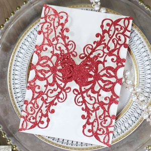 European laser cut butterfly wedding invitation in red glitter with pearlescent inner card