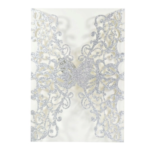 European laser cut silver glitter wedding invitation featuring a decorative butterfly design