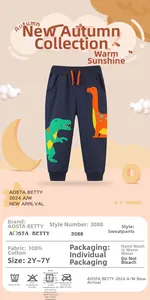 Detailed view of kids' navy cotton joggers with dinosaur print and orange drawstring