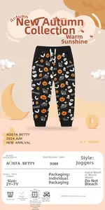 Detail of 100% cotton Halloween joggers for kids with pumpkin and ghost prints