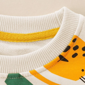 Boys' crewneck sweatshirt in cream with vibrant yellow and green pattern detailing