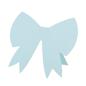 Detail of light blue 3D bow place card with matte texture and layered cut design