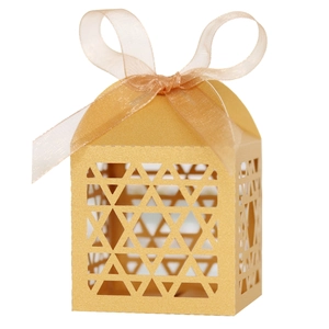 Elegant gold laser cut Hanukkah gift box with hexagonal pattern and silk ribbon