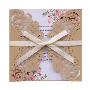 Laser cut hollow wedding invitation with kraft shell, floral card and silk ribbon bow