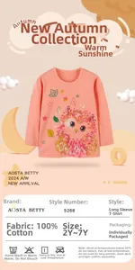 Detail of girls cotton long sleeve shirt with cute owl print and glitter accents