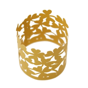 Detailed laser-cut gold paper napkin ring with elegant heart and leaf hollow patterns