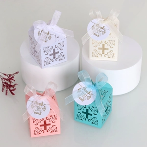 Laser-cut wedding favor boxes with cross window and thank you tag in four pastel colors