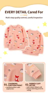 Detail view of pink kids sweatshirt with hedgehog and fox cartoon prints and ribbed cuffs