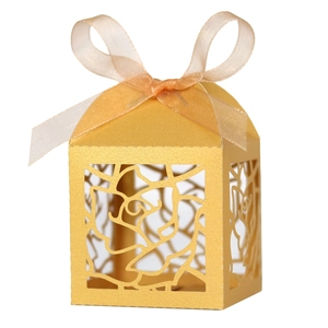 Elegant gold laser cut rose wedding favor box with champagne ribbon for party candy storage