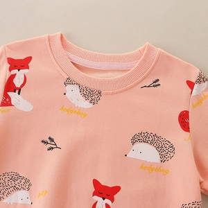 Pink crewneck kids sweatshirt with cute fox and hedgehog prints and ribbed collar details