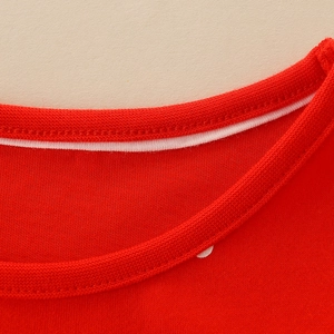 Girl's red cotton Christmas dress featuring high-quality round neck stitching detail