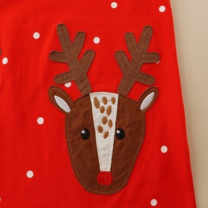 Girls red Christmas dress with reindeer embroidery and white polka dots on knit fabric