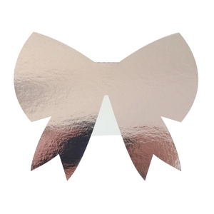 Detailed macro view of rose gold 3D bow name card with metallic finish for wedding tables