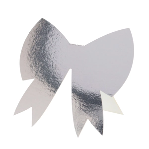 Close-up of metallic silver 3D bow place card with laser cut finish for weddings
