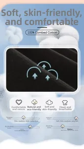 Detail of 100% combed cotton fabric showing soft black knit texture and breathability