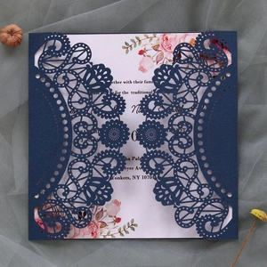 Detailed laser-cut hollow lace wedding invitation in navy blue with elegant rose inner card