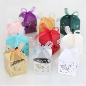 Detailed laser-cut hibiscus and monstera leaf hollow candy gift boxes in assorted colors