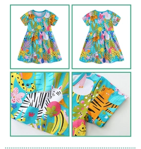 Detail of girls summer dress featuring tropical jungle animal prints and stitching
