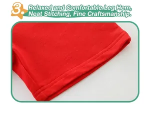 Close-up of red cotton shorts hem showing high-quality double-needle stitching and fabric texture