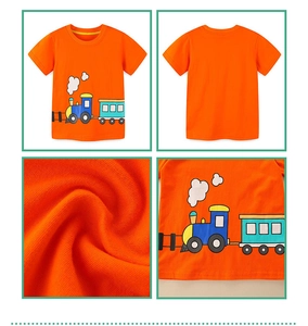 Close-up of bright orange kids cotton t-shirt featuring a blue cartoon train print