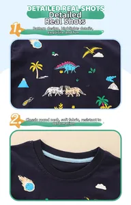 Close-up of the dinosaur and volcano cartoon prints on soft cotton boys T-shirt