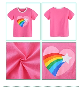 Close-up of pink cotton T-shirt featuring rainbow heart print and contrast crew neck