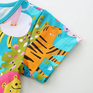 Short sleeve cotton girls dress with vibrant cartoon animal prints and blue ribbed neckline