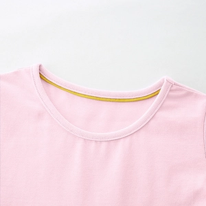 Girls cartoon print princess dress in light pink featuring a ribbed round neckline