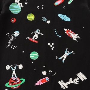 Boys' summer cotton t-shirt with colorful cartoon astronaut and space prints on black fabric