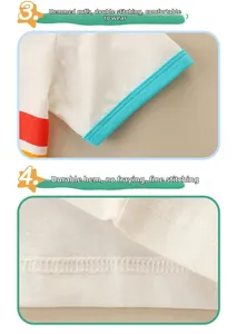 Détail des finitions à double couture aux poignets et à l'ourlet du t-shirt en coton