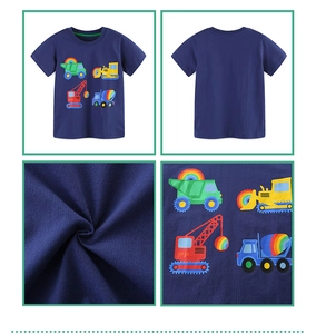 Detail of navy cotton boy t-shirt showing cartoon construction trucks and soft fabric texture