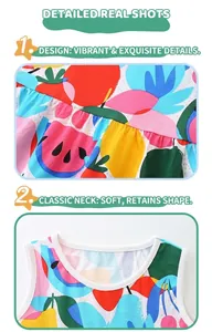 Détail de l'encolure ronde et du tricot de coton doux avec imprimés de fruits variés