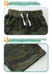 Détail du short camouflage enfant montrant la taille élastiquée et les ourlets piqués