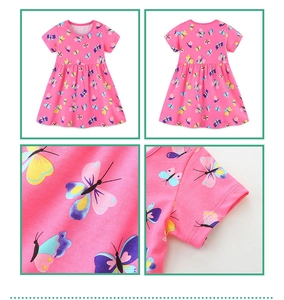 Detailed views of girls' pink cotton dress with colorful butterfly prints and stitching