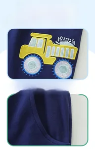 Close-up of boys' cotton knit pants with excavator embroidery and side pocket